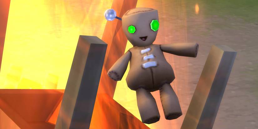 A voodoo doll is being burnt in a bonfire in The Sims 4