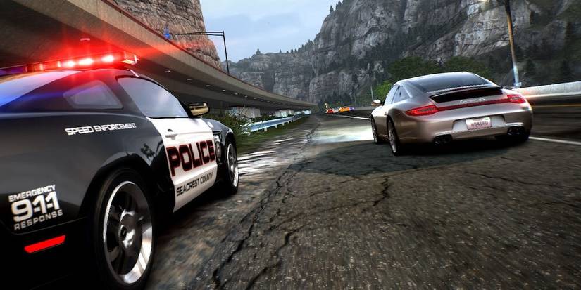 Cop Car Chasing A Street Racer