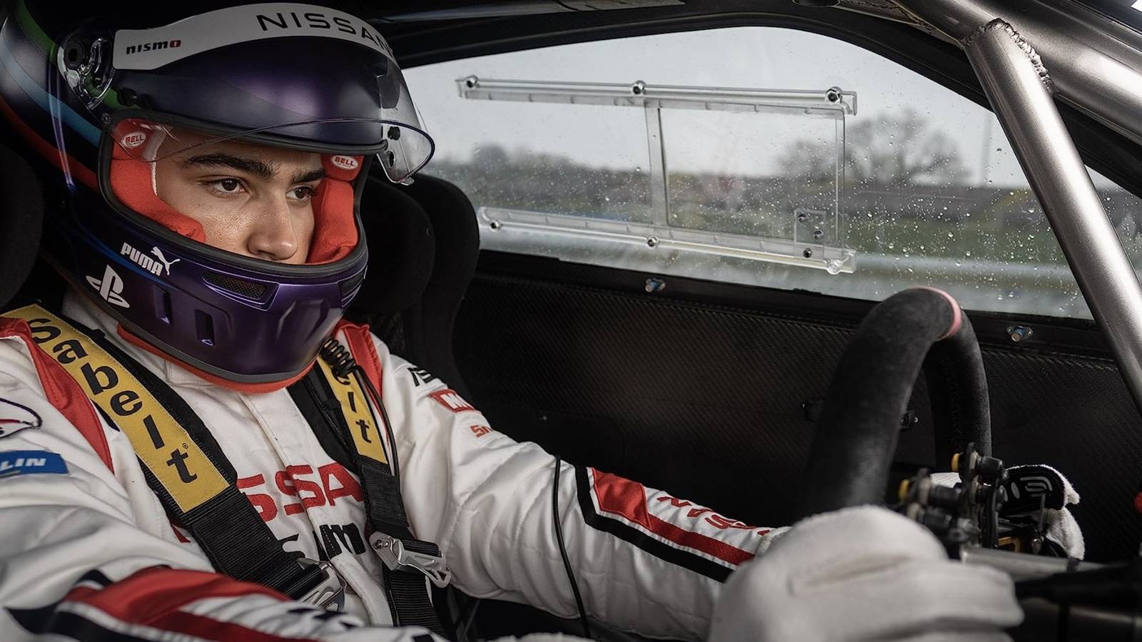 archie madekwe driving in gran turismo Cropped