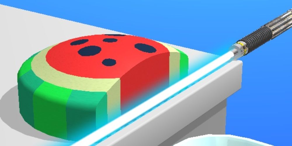 The player using a lightsaber to chop a watermelon in ASMR Slicing