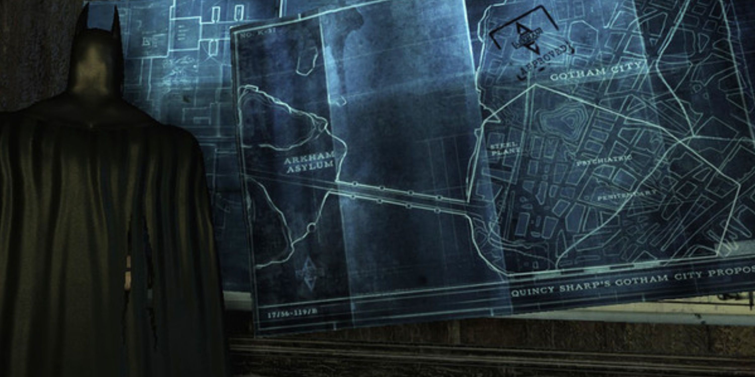 batman looking at blueprints for arkham city
