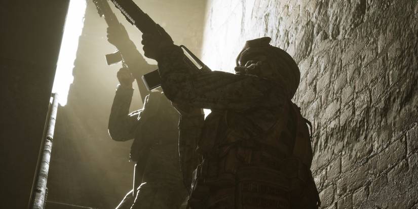 a ready soldier and an assist soldier clearing upstairs in six days in Fallujah 