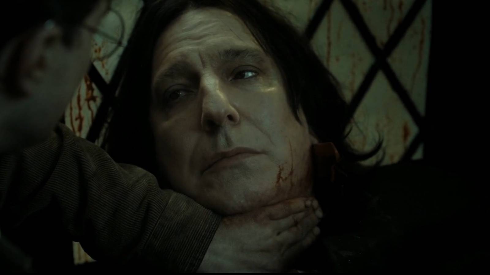 Harry looks at the dying Snape in Harry Potter and the Deathly Hallows: Part 2.