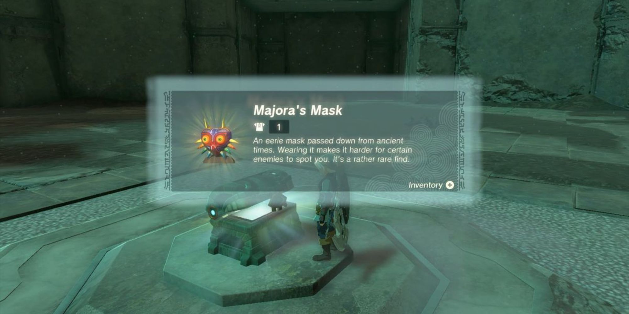 Link finding Majora's Mask in a treasure chest