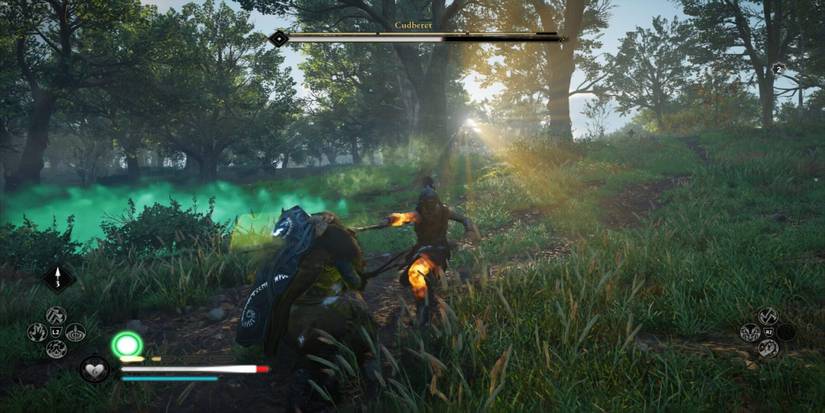 Eivor fighting a boss in a field