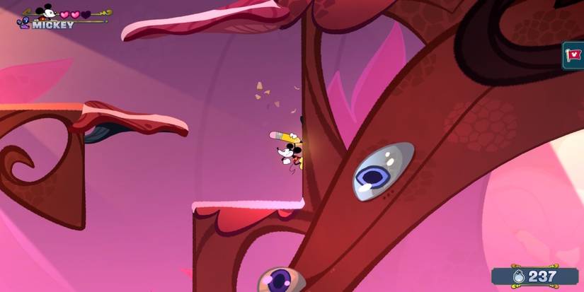 Exploring a level in Disney Illusion Island