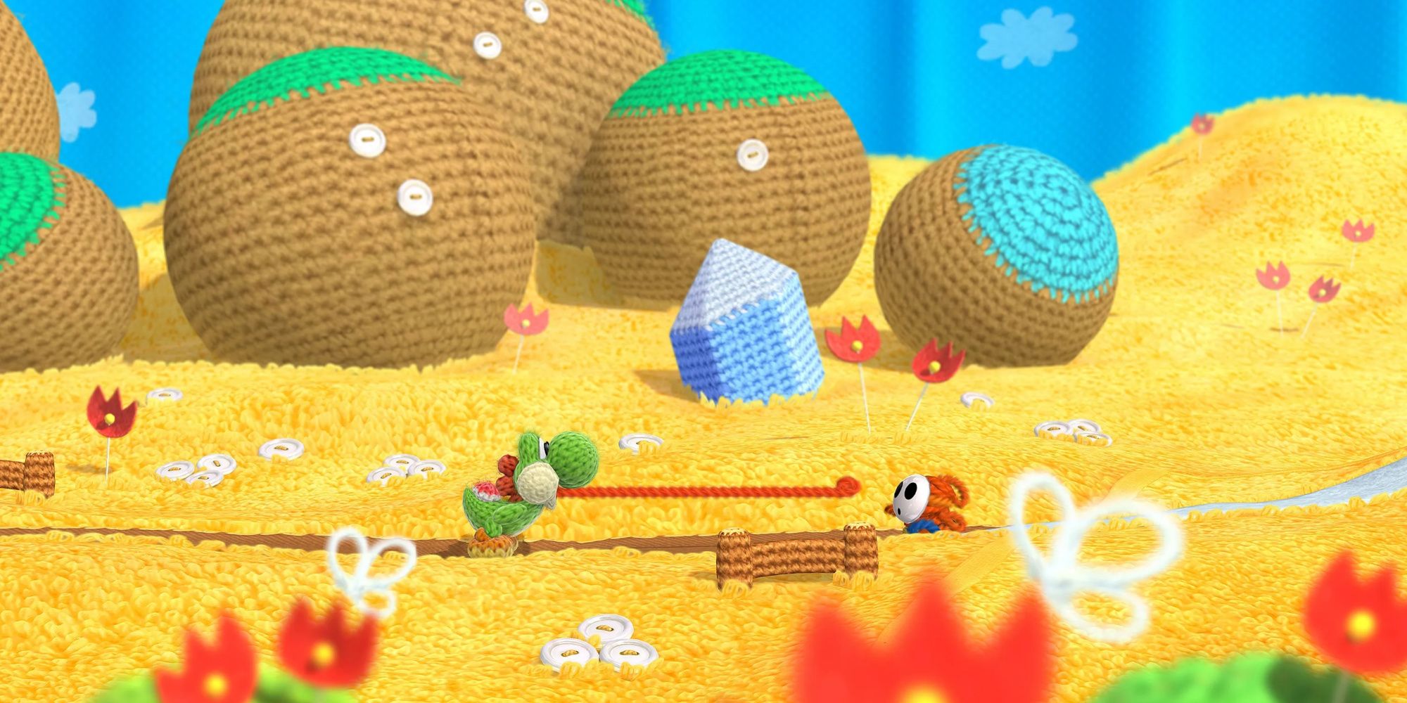 Fighting enemies in Yoshi’s Woolly World