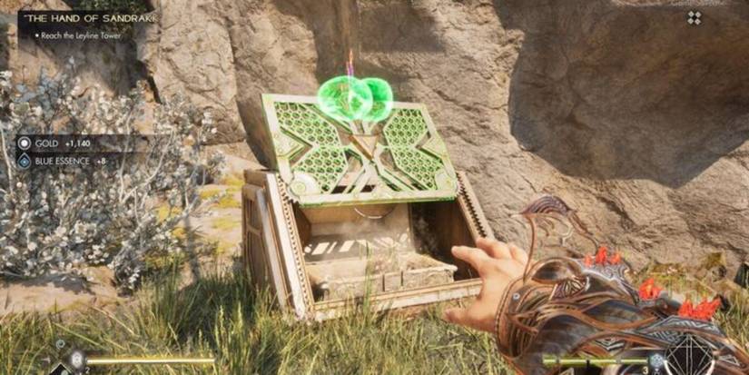 An opened green box from Immortals of Aveum being held open by Limpets