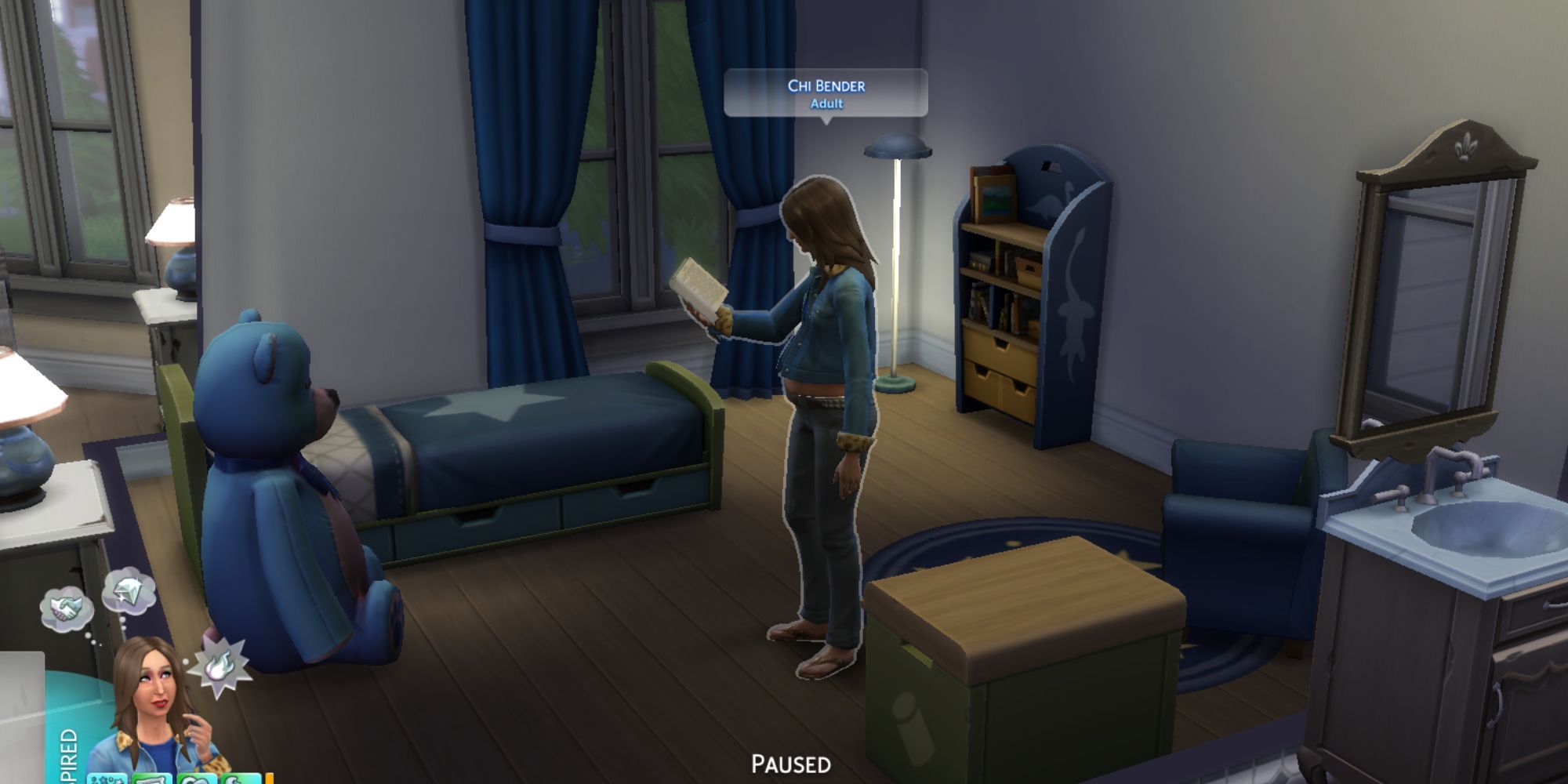 a pregnant sim reading book sims 4