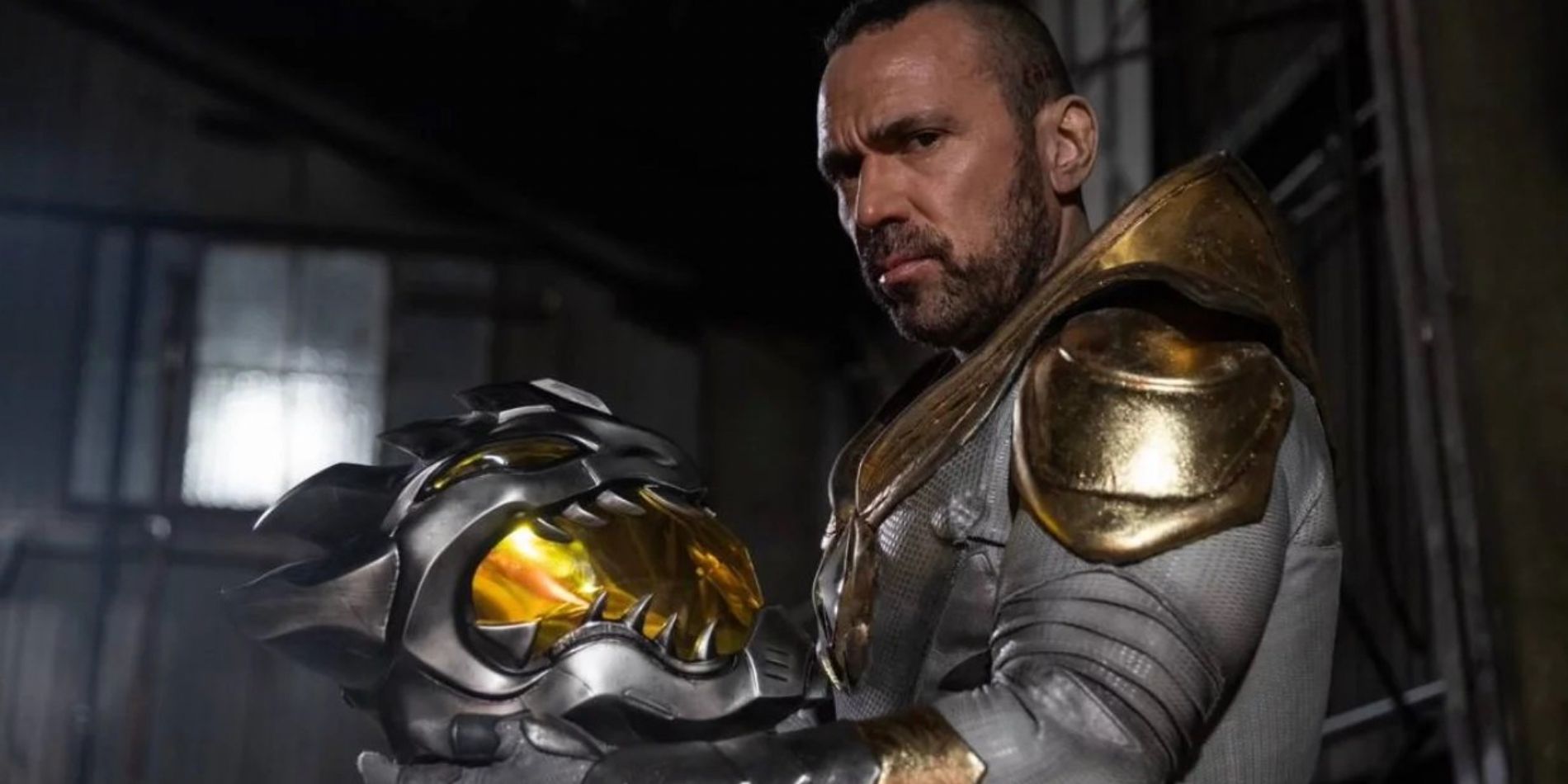 Jason David Frank staring at the camera in his white dragon armor for Legend of the White Dragon