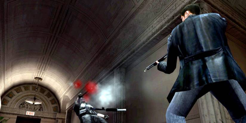 Max Payne shooting an enemy in Max Payne