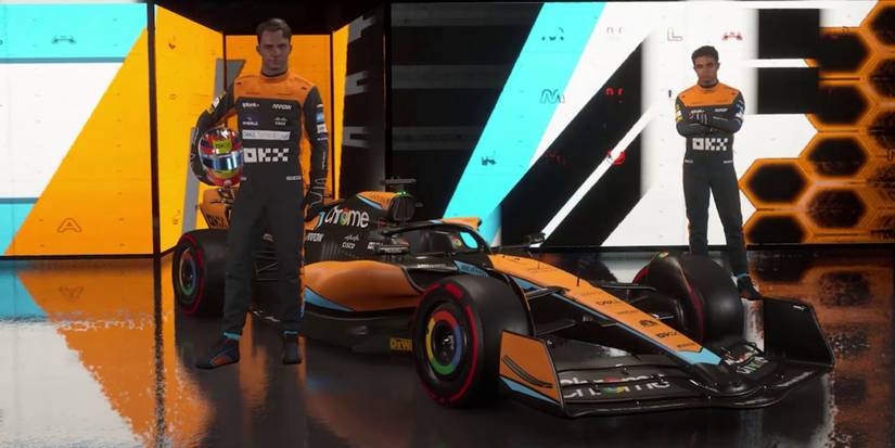 mclaren car with two drivers standing beside it