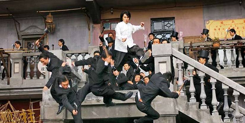 Sing kicks the Axe Gang down a set of stairs