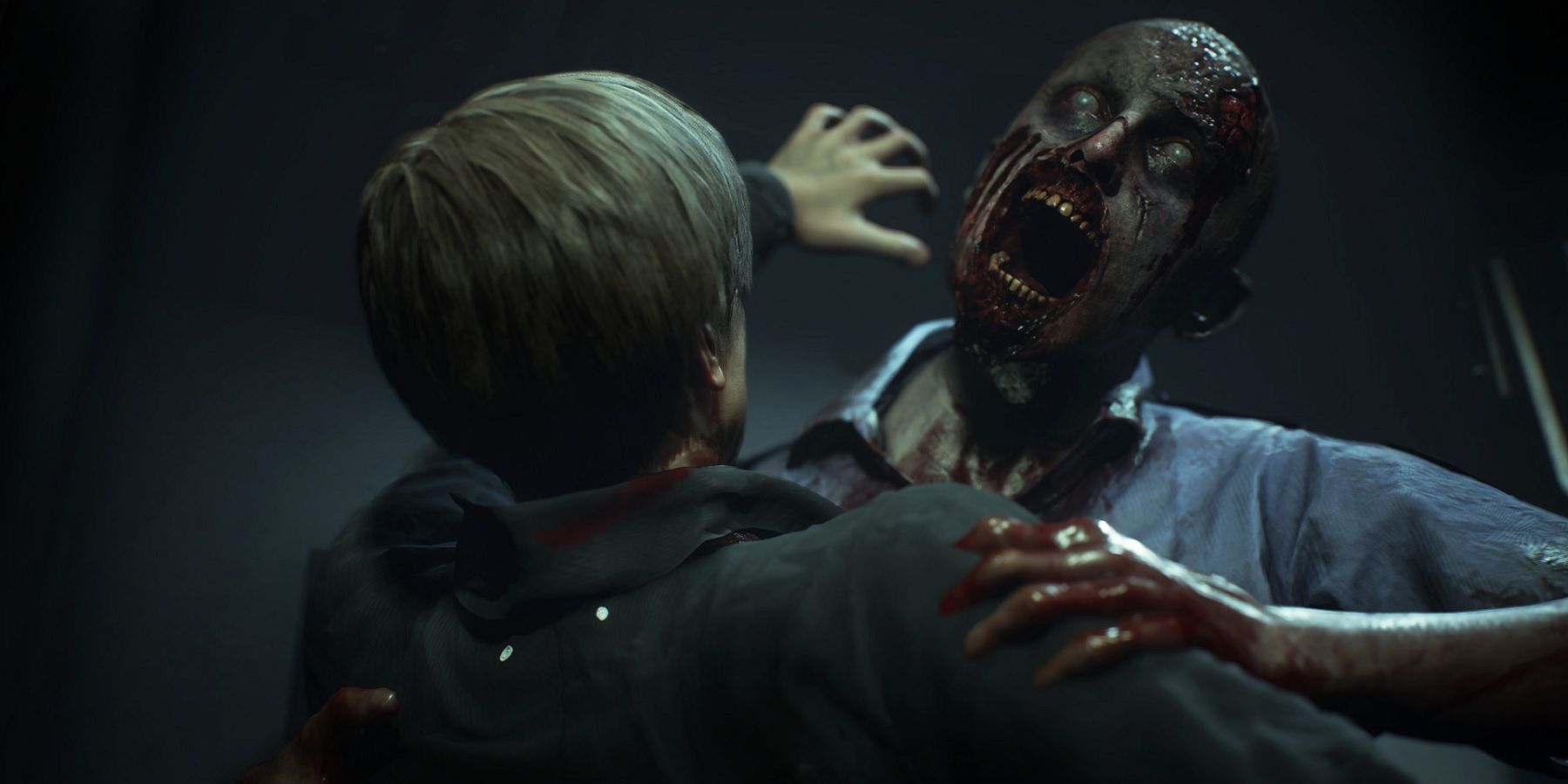 resident evil 2 remake leon being attacked by zombie