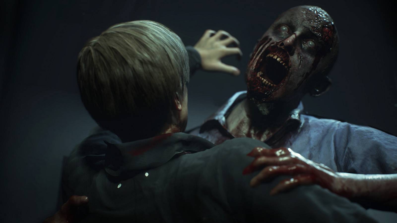 resident evil 2 remake leon being attacked by zombie