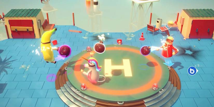 Three players: a banana, a unicorn, and an individual in a ski mask. They are throwing bombs at each other on a helipad in Rubber Bandits