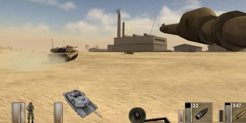 Two Tanks Approaching A Building In The Desert