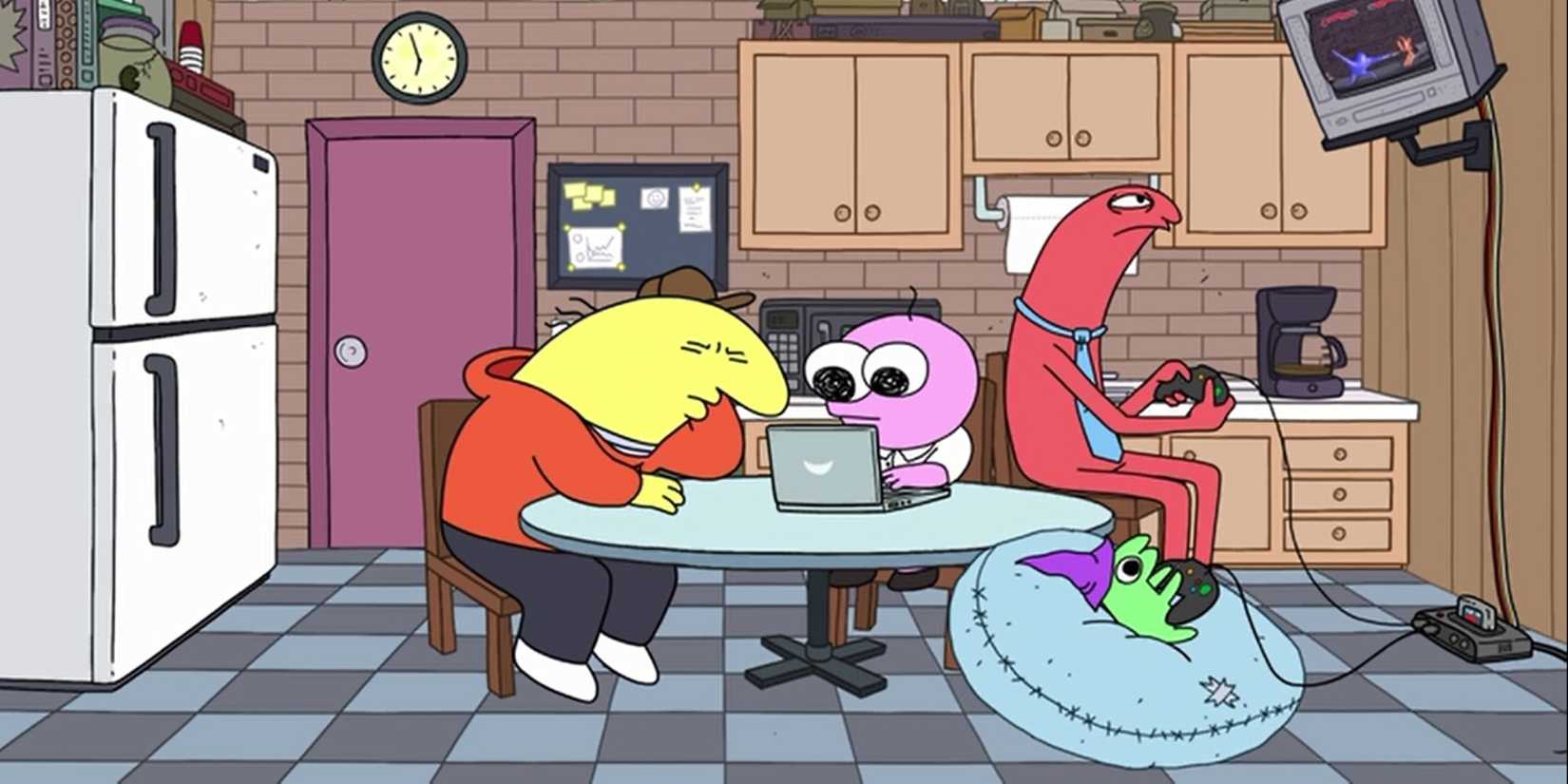 Charlie dan Pip duduk di depan komputer di dapur di Smiling Friends