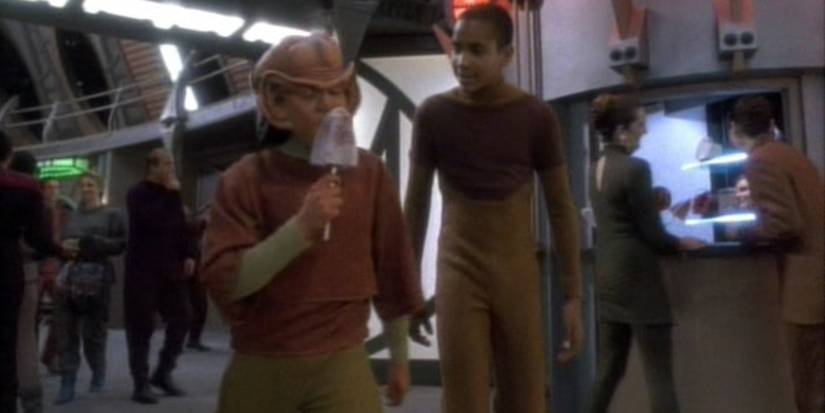Young Ferengi Nog enjoys a jumja stick with Jake Sisko.