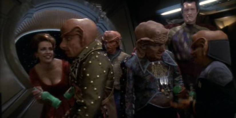 A group of Ferengi with several bottles of Slug-o-Cola.
