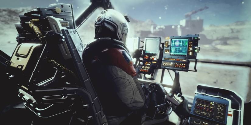 Starfield gameplay deep dive screenshot character sitting in cockpit chair