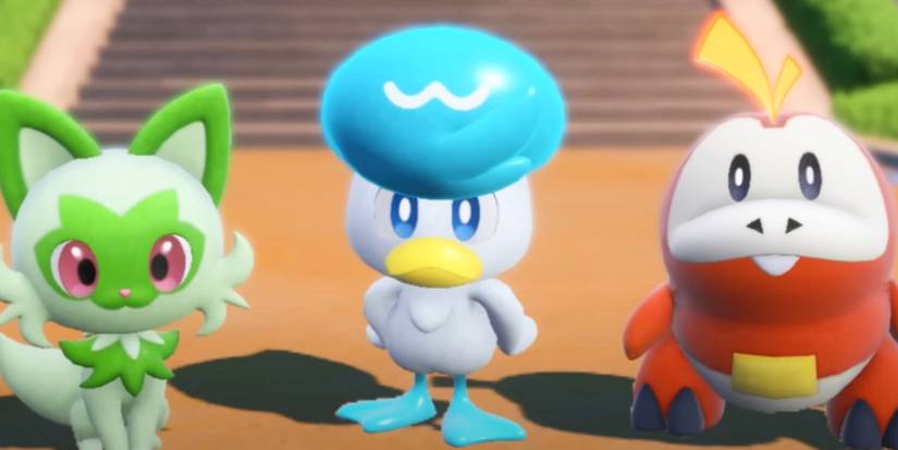 The Three Starter Pokemon From generation 9 Lined Up