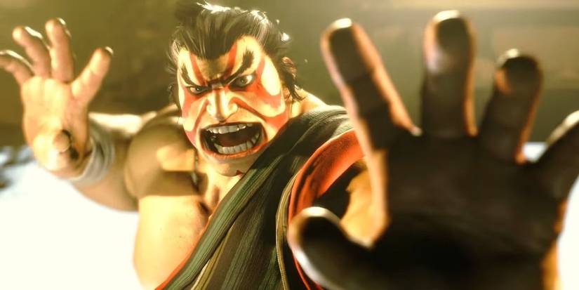 A screenshot of E Honda getting ready for a match amid golden light in Street Fighter 6.
