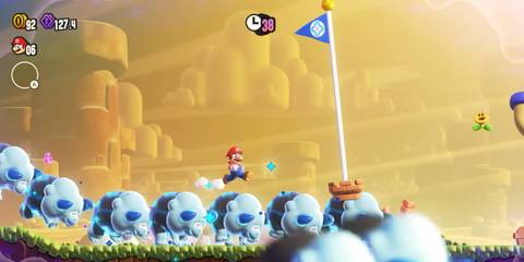 Mario riding a stampede through a goal flag in Super Mario Bros. Wonder