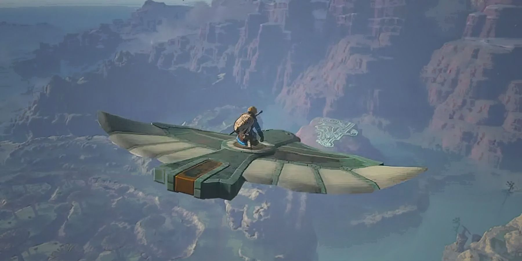 The Legend of Zelda Tears of the Kingdom TOTK Link flying on Zonai Wing above Geoglyph upscaled
