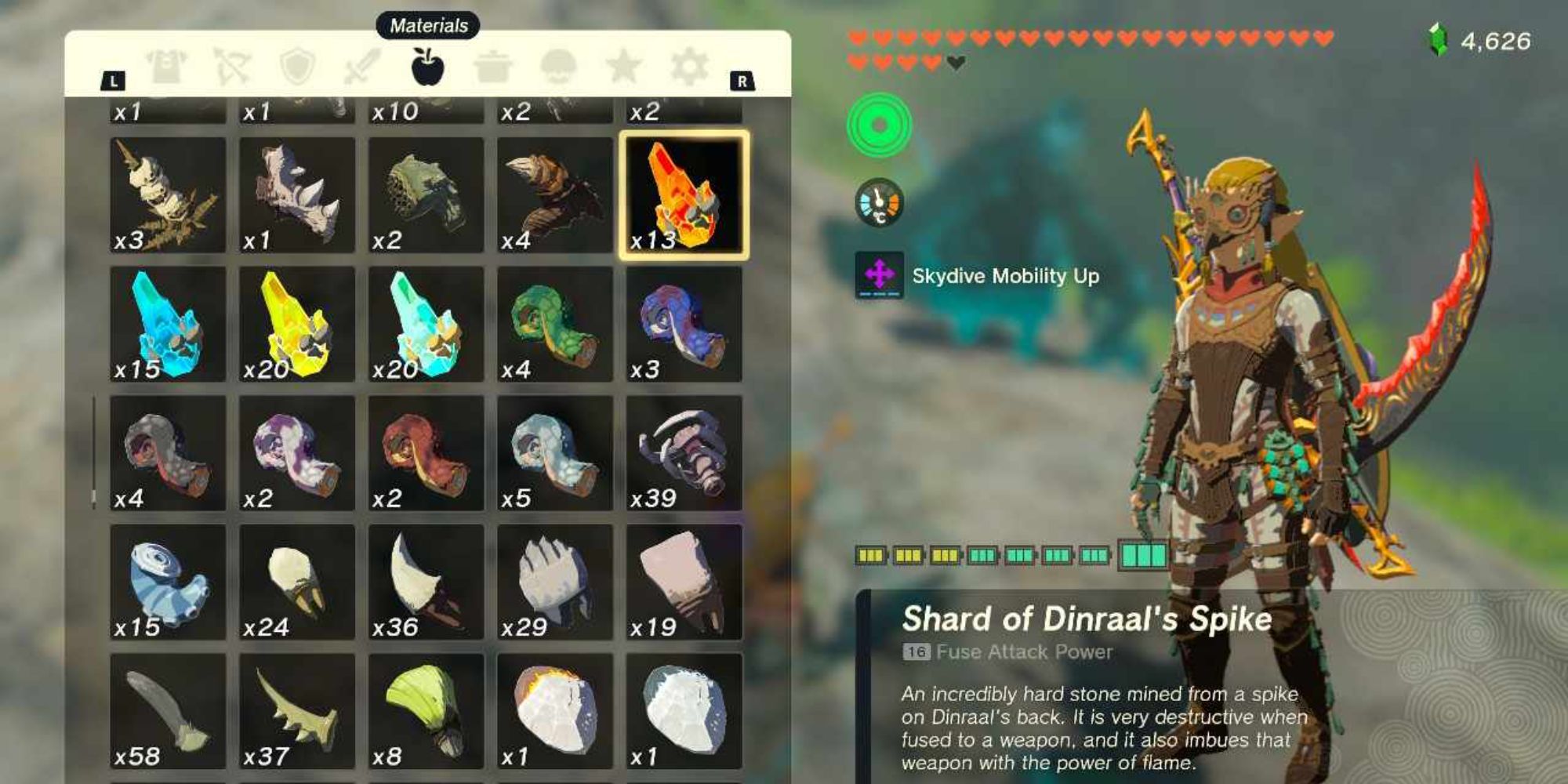 Link from Tears of the Kingdom stood beside his inventory, which is showing a Shard of Dinraal's Spike