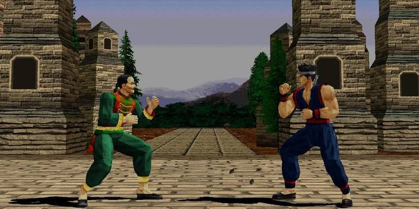 Virtua Fighter 2 player fighters on stage with brick work 