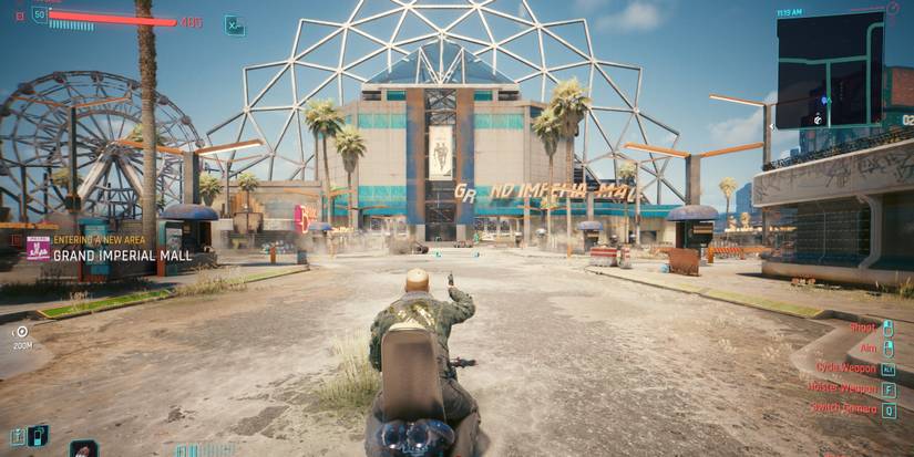 v shooting a gun on a motorcycle