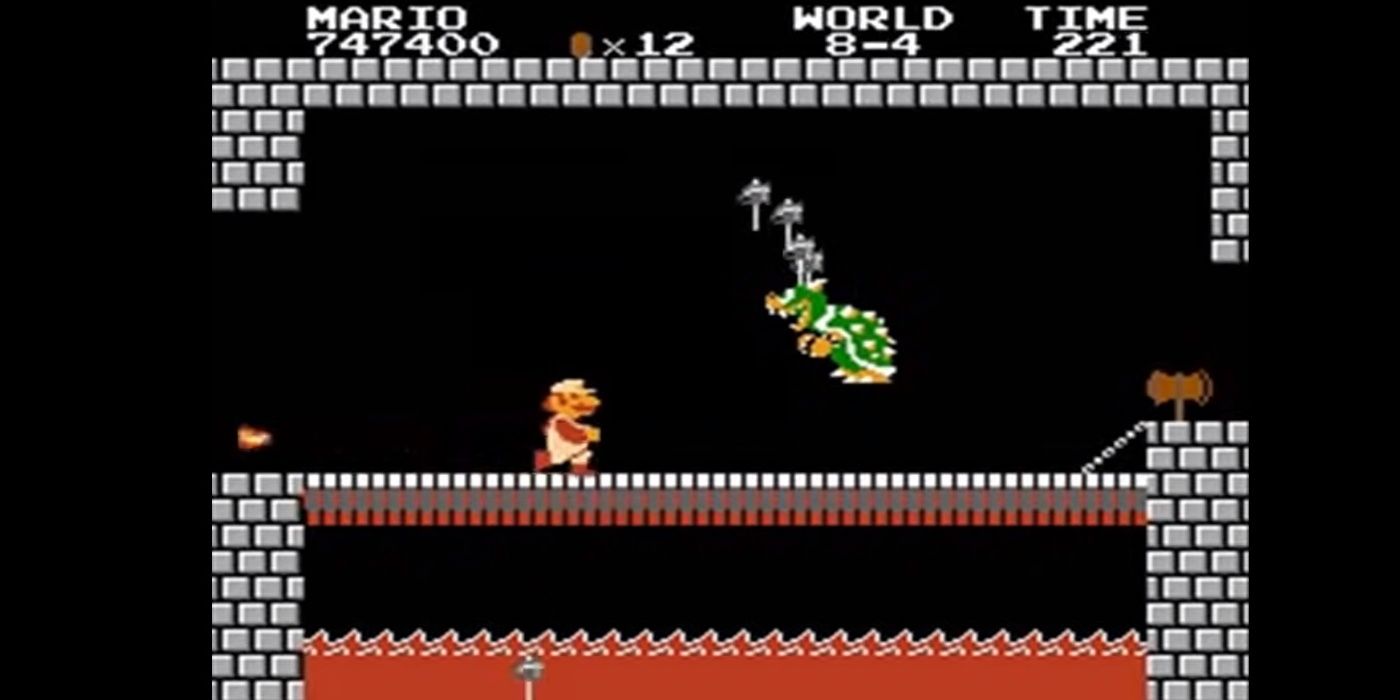 mario facing off against bowser in smb1