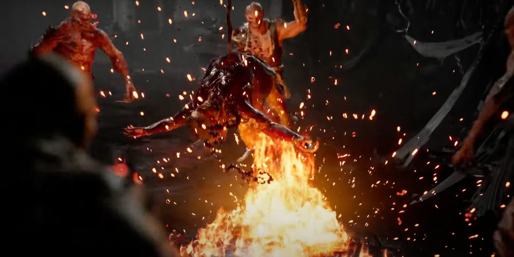Baraka raoasting an enemy over a fire with tarkatans