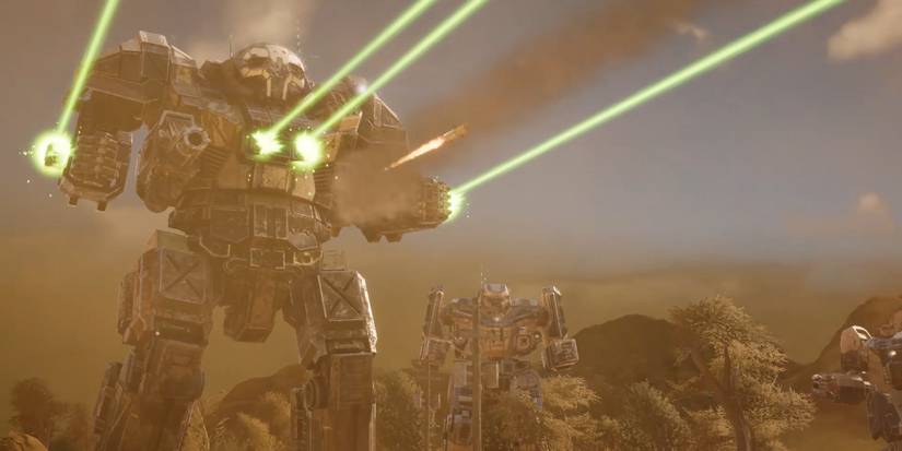 A mech shooting four green lasers into the distance with two mechs looking on.