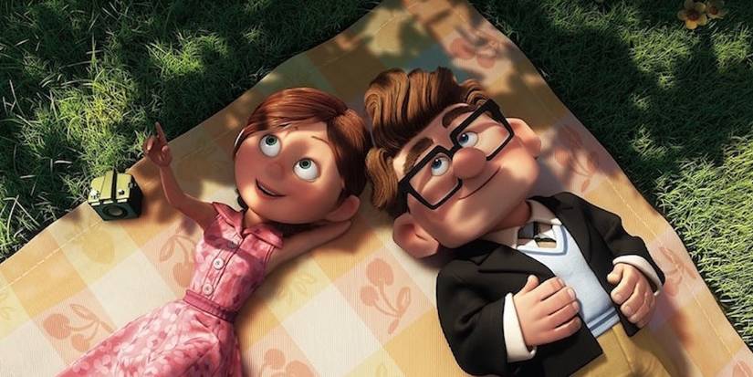 Carl and Ellie lieing down under a shed