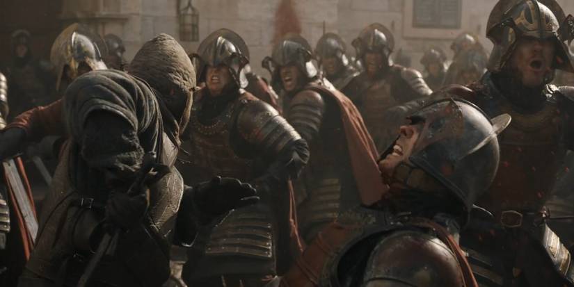 The Lannister army men fighting in Game of Thrones.