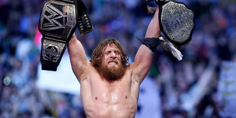 Daniel Bryan holding belts WrestleMania 30