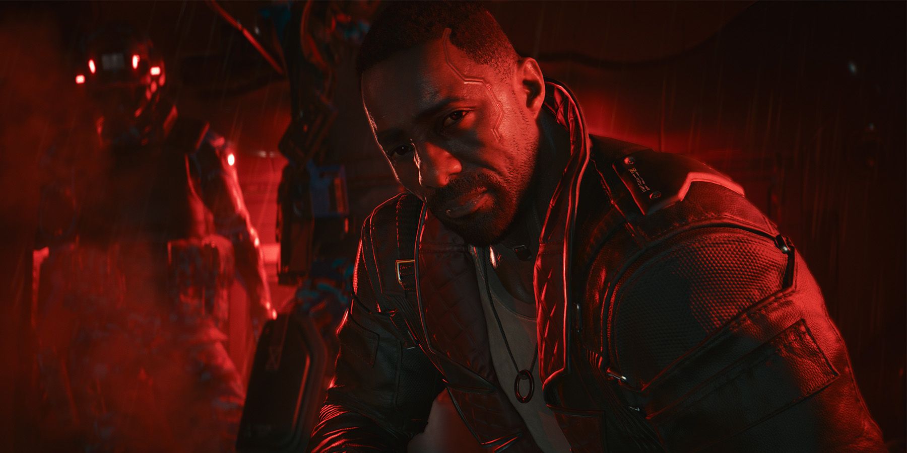 A screenshot of Idris Elba as Solomon Reed against a red light in Cyberpunk 2077: Phantom Liberty.