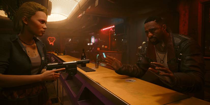 daphne/alex holding a gun at solomon reed