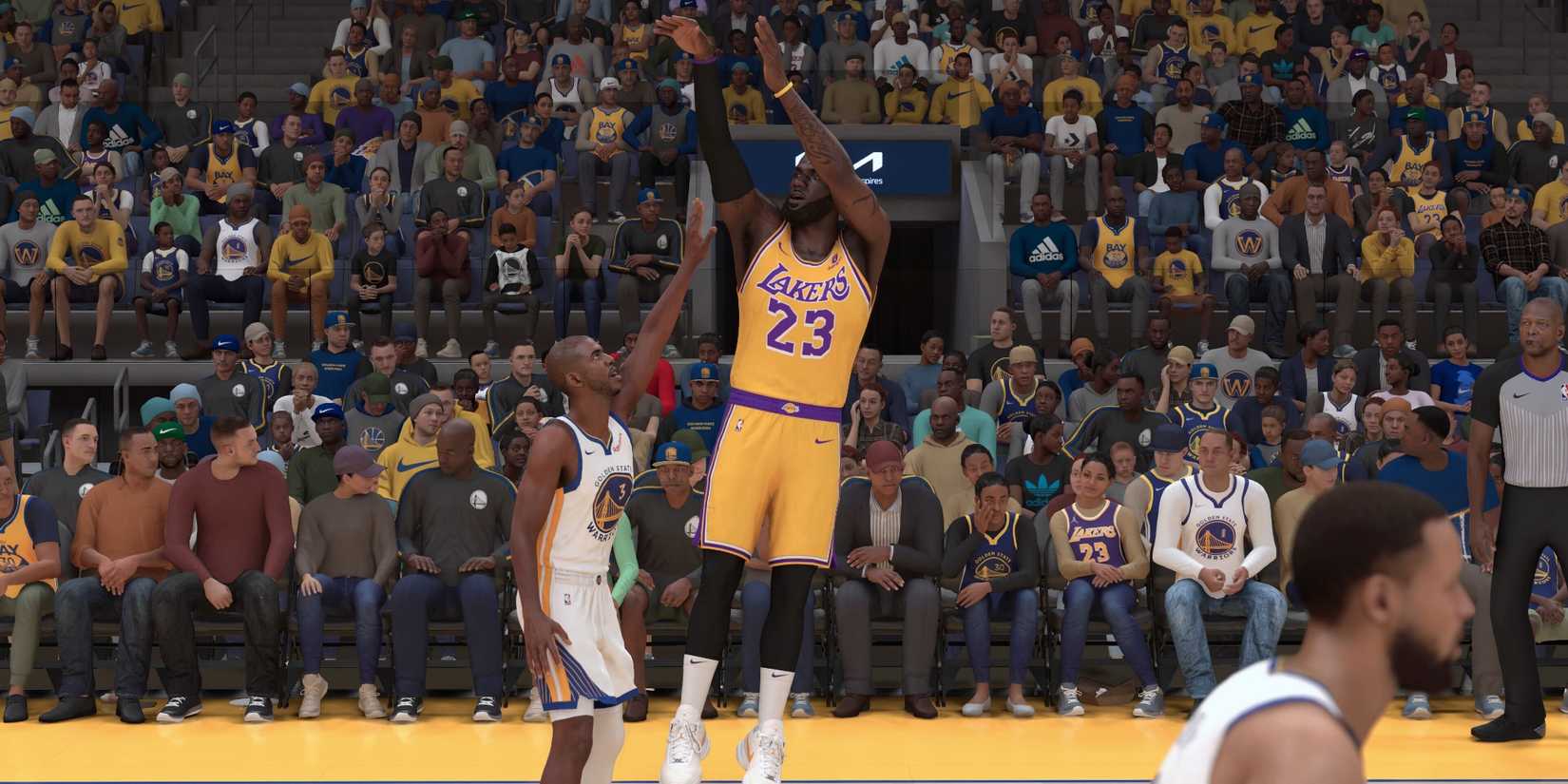 Chris Paul defending a 3-point shot attempt by LeBron James in NBA 2K24