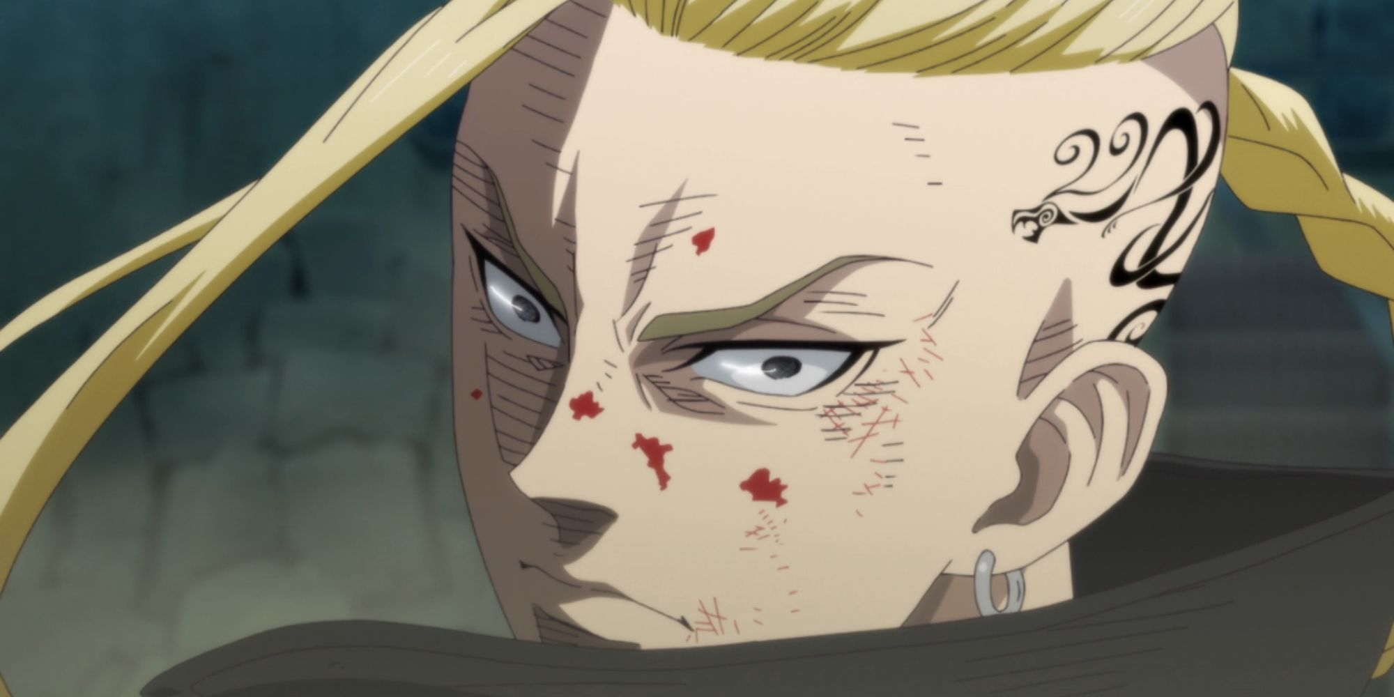 a boy with a dragon head tattoo and blonde hair, has blood on his face