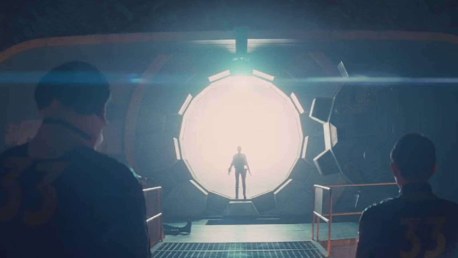 Three characters from the Fallout TV series standing in front of a Vault door.