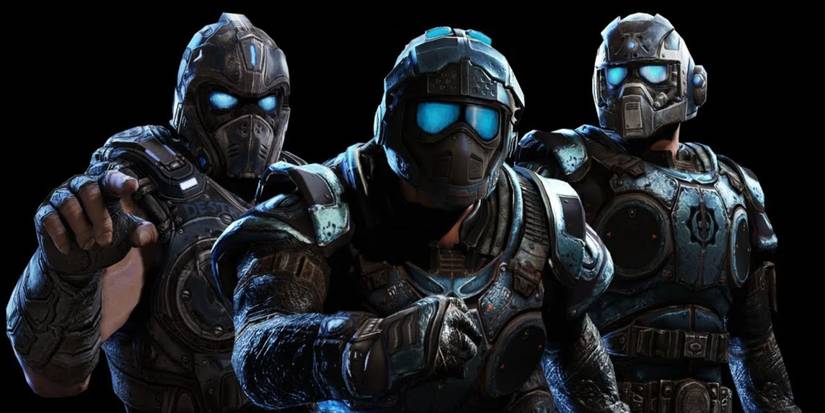 Gears of War's Carmine Brothers in their respective army outfits, looking out.