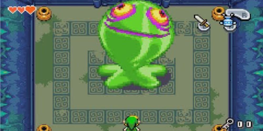 Link faces the Giant Green ChuChu in the depths of Deepwood Shrine.