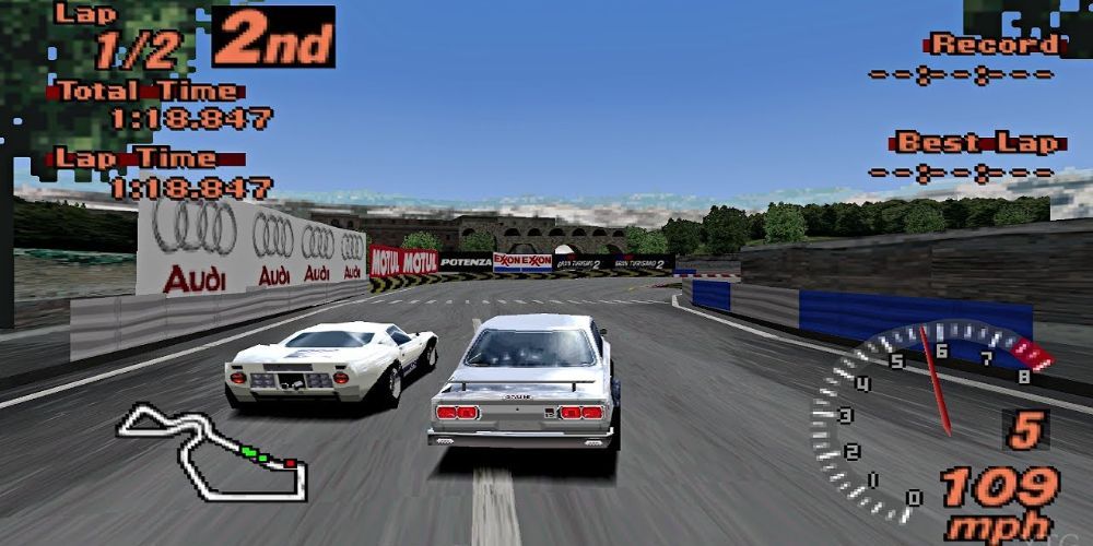 Two silver cars racing in Gran Turismo 2 