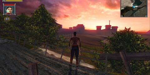 Jade Empire character overlooks land as sun sets in distance