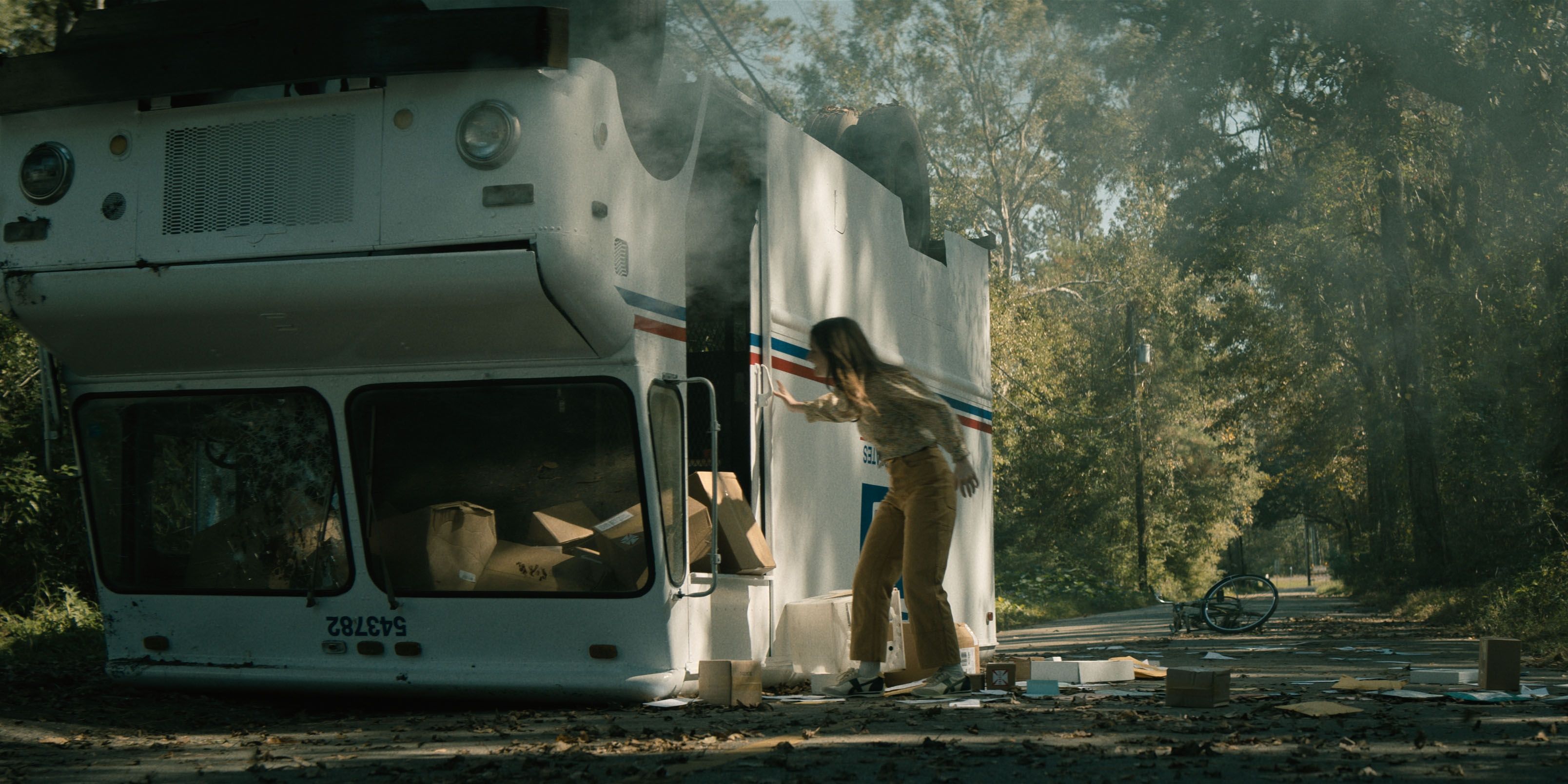 kaitlyn dever inspects mail truck no one will save you Cropped