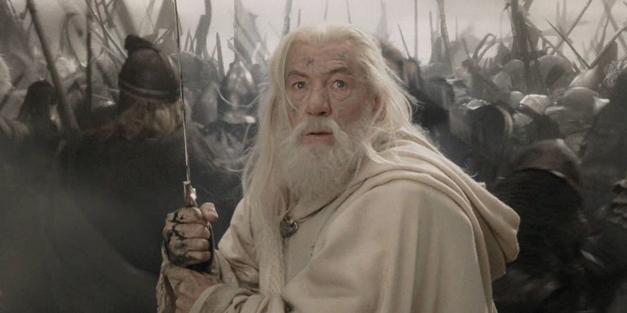 Gandalf the White wielding a sword during battle.