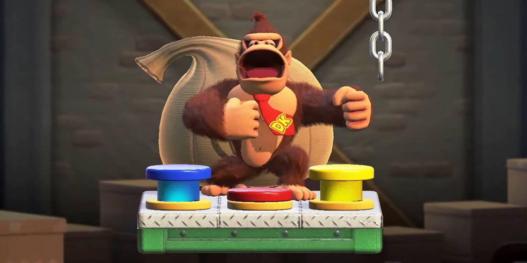 A screenshot of Donkey Kong standing in front of three multicolored buttons in Mario vs. Donkey Kong.